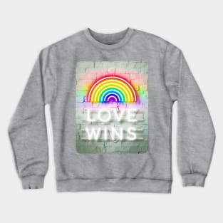 Love Wins Neon Sign on White Brick Wall Crewneck Sweatshirt